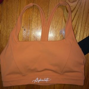 Alphalete pulse kinetic sports bra sun kissed NWT